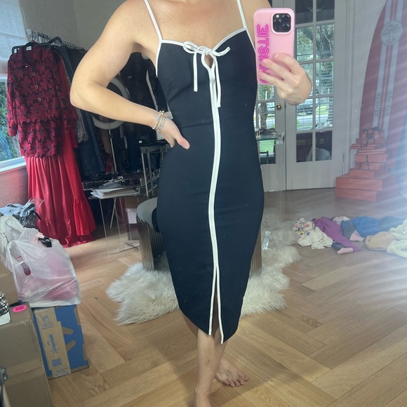 Dresses & Skirts - Designer Little black dress!